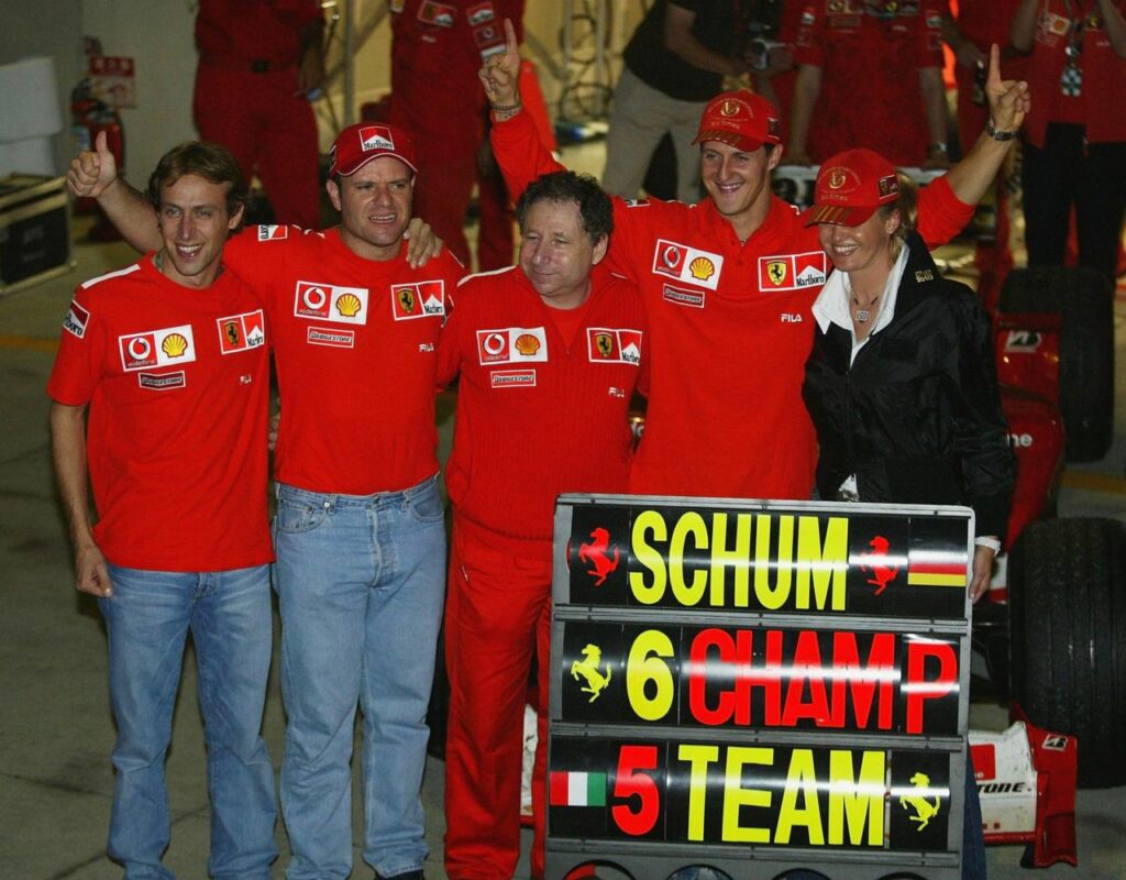 schumacher avec rubens barichello et deux méchaniciens